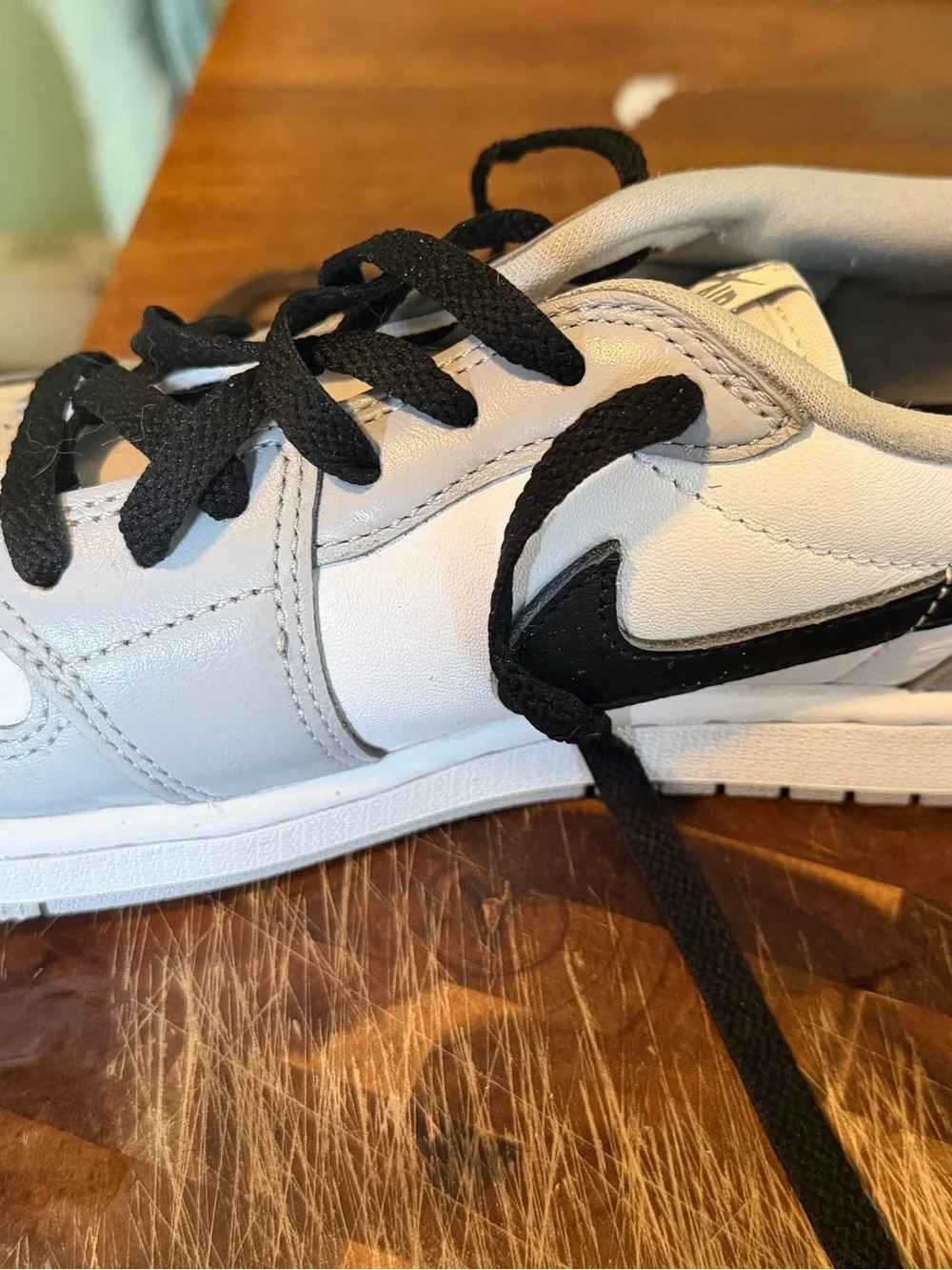 Jordan Men’s White, Gray and Black Low-Top Sneakers